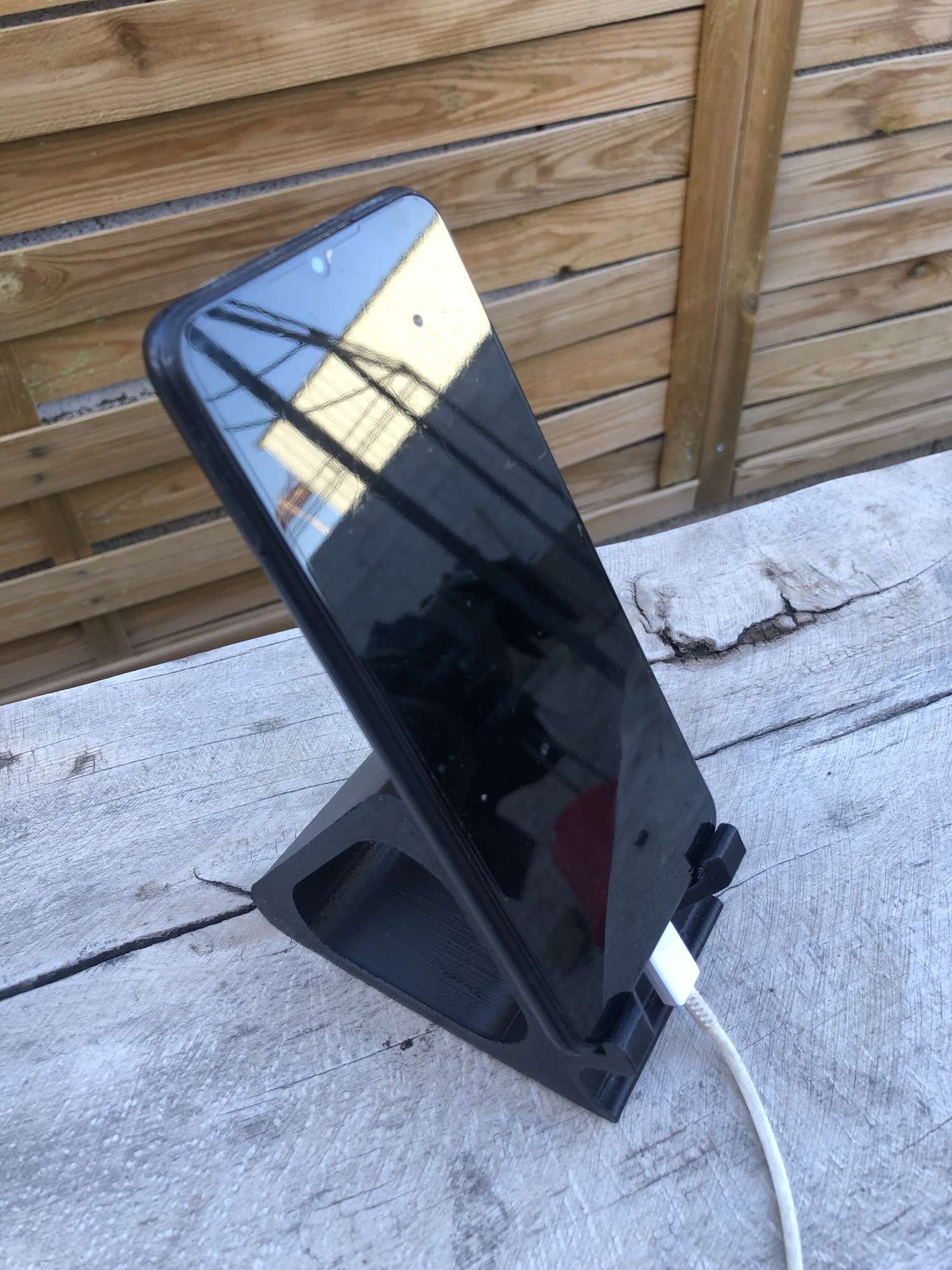 mobile_device_stand_with_cable_pass_through_3D_printed